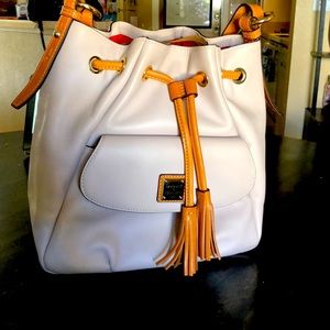 Dooney & Bourke cream leather drawstring handbag